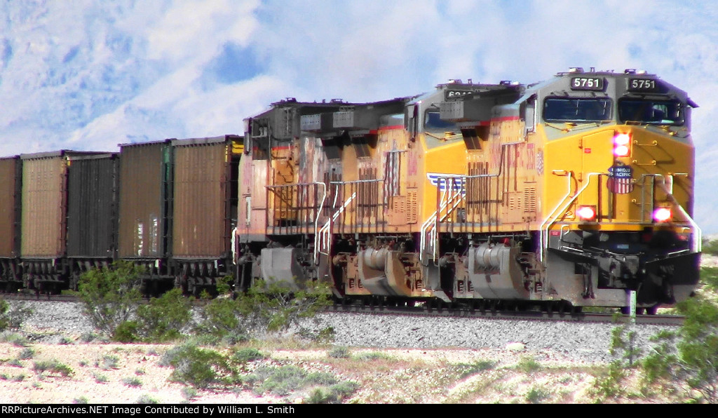 EB Unit Empty Hooper Car Frt at Erie NV -1